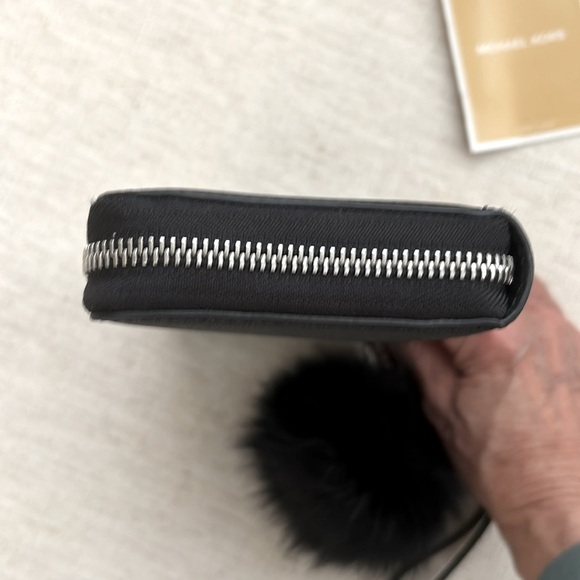 Michael Kors Wristlet. Black/Silver. Excellent Condition. MK fur key chain. - Picture 7 of 8